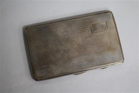 A 1930s Art Deco engine turned silver cigarette case, engraved with masonic bee, 14cm.